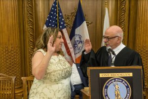 Aimee Richter being sworn in as president of the Brooklyn Bar Association by past President Hon. Jeffrey Sunshine. Eagle photos by Rob Abruzzese