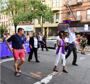 New York City Mayor Bill de Blasio, bottom center, marches during the New York City Pride Parade on Sunday. AP Photo/Andres Kudacki