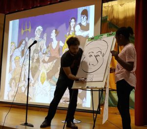 Bestselling graphic novel writer George O’Connor demonstrates how to create illustrations for a book at the Community Book Fair at P.S. 24. Photo by Liz Koch