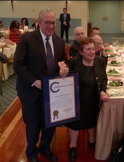 New York state Comptroller Scott Stringer presents Mary Sansone with her commendation. Eagle photos by John Alexander