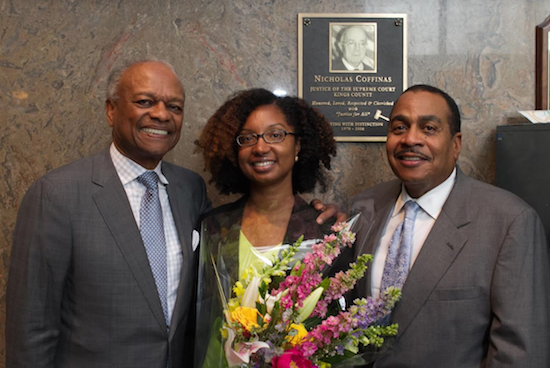 Law Clerk Inga O’Neale (center) was honored as the Employee of the Year during a ceremony in June. Pictured from left is retired Justice Randolph Jackson, Inga O’Neale and Hon. Larry D. Martin standing in front of a plaque for the late Justice Nicholas Coffinas. Photos by Rod Randall