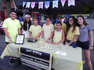 Members of the Bay Ridge Lemonade Coalition had just the thing for a hot summer night. They sold lemonade to pedestrians. Eagle photos by Paula Katinas