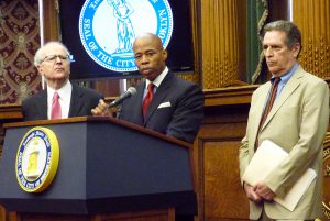 Brooklyn Borough President Eric Adams was joined by former Chief Judge of the New York Court of Appeals Jonathan Lippman (left) and former New York Civil Liberties Union Executive Director Norman Siegel (right) in calling for a statewide blue ribbon commission to investigate Brooklyn’s shameful history of wrongful convictions. Photo by Mary Frost