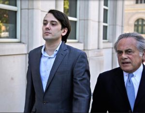 In this June 26, 2017 file photo, former Turing Pharmaceuticals CEO Martin Shkreli, left, arrives at federal court with his attorney Benjamin Brafman in Brooklyn. AP Photo/Seth Wenig, file