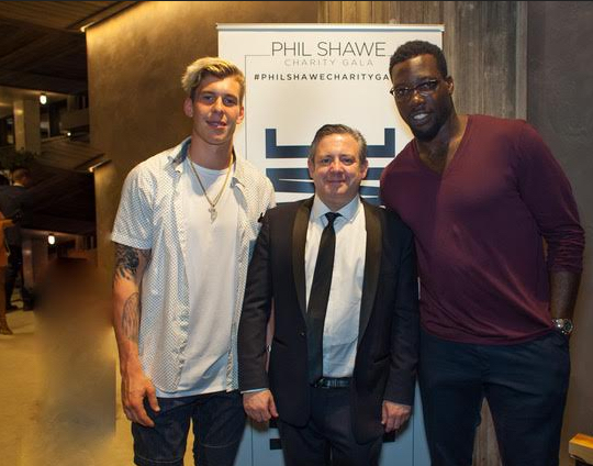 Philip R. Shawe (center), is pictured with New York Giants Bradley Wing (left) and Jason Pierre-Paul (right) during the Phil Shawe Charity Gala, which gave out $115,000 worth of scholarships to three law school students. Photos courtesy of the Phil Shawe Summer Charity Gala
