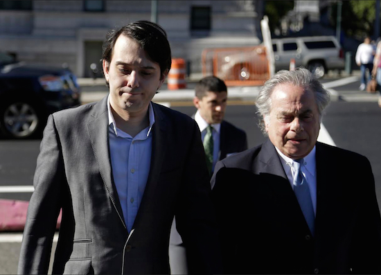 Former Turing Pharmaceuticals CEO Martin Shkreli, left, with his attorney Benjamin Brafman. AP Photo/Seth Wenig