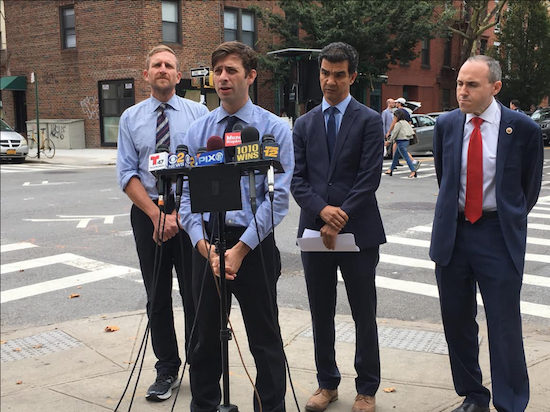 From left: Transportation Alternatives Executive Director Paul Steely White with Councilmembers Steven Levin, Ydanis Rodriguez and Mark Treyger. Eagle photo by Mary Frost