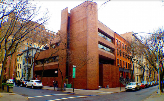 The Brutalist-style building on the corner plus the three townhouses to the right are 117-125 Columbia Heights, which the Jehovah’s Witnesses just sold to a California-based investment firm. Eagle file photo by Lore Croghan