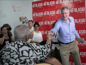 Mayor Bill de Blasio meets voters at a recent campaign event. Photo by William Alatriste