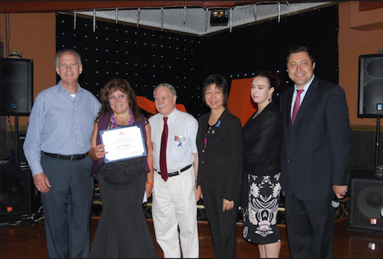 From left: U.S. Rep. Dan Donovan, Leonora Bulychova, founder of the Aelita Club holding her award; District 47 Assemblymember William Colton; City Council candidate Nancy Tong; attorney Anna Latkovskaia; and Democratic District leader Ari Kagan. Eagle photos by Arthur De Gaeta