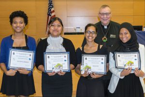 The Brooklyn Supreme Court held a “closing ceremony” for students who took part in the annual summer Kings County Courts Student Employment and Internship Program. Pictured is the Rev. James Goode and the students who took part in the Izetta Johnson Essay Contest. Eagle photos by Rob Abruzzese