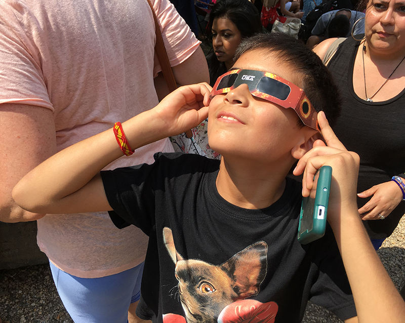 Gabriel Sanchez was one of hundreds who gathered at Pioneer Works in Red Hook on Monday for a free event celebrating the solar eclipse. Photos by Mary Frost