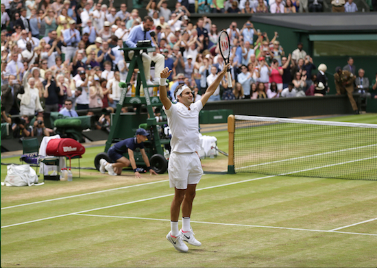 Switzerland's Roger Federer celebrates after defeating Croatia's Marin Cilic to win the Men's Singles final match on day thirteen at the Wimbledon Tennis Championships in London Sunday, July 16, 2017. AP Photo/Tim Ireland