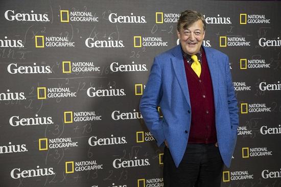 Comedian Stephen Fry poses for photographers upon arrival at the premiere of the film “Genius” in London on March 30. Photo by Vianney Le Caer/Invision/AP
