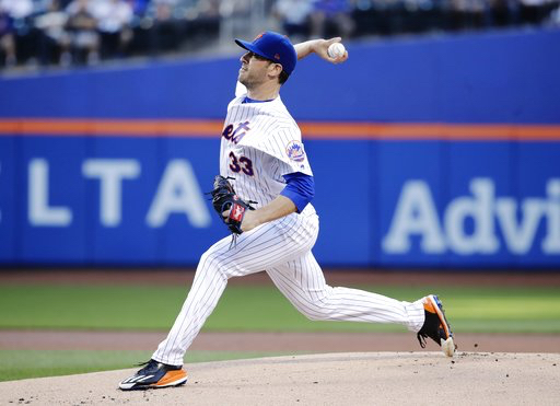 In this June 14 file photo, New York Mets' Matt Harvey winds up during the first inning of the team's baseball game against the Chicago Cubs in New York. AP Photo/Frank Franklin II, File
