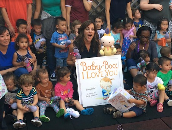 Sheryl Haft joins kids at Magical Years Early Childhood Center for a reading and a sing-a-long of her newly released book. Photo courtesy of Family Health Centers at NYU Langone