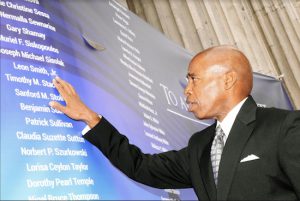 Borough President Eric Adams points to names on the newly unveiled banner. Photos: Erica Sherman/Brooklyn Borough President’s Office