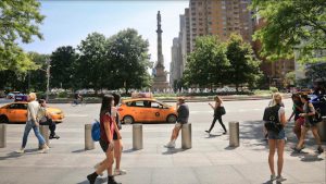 The Christopher Columbus statue is shown at Manhattan's Columbus Circle at W. 59th Street in the background, Sunday Aug. 27, 2017, in New York. AP Photo/Bebeto Matthews