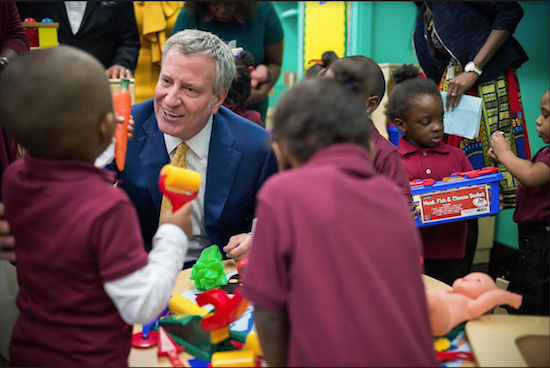 Mayor Bill de Blasio talks with 3-K for All students. Photo courtesy of the Mayor’s Office
