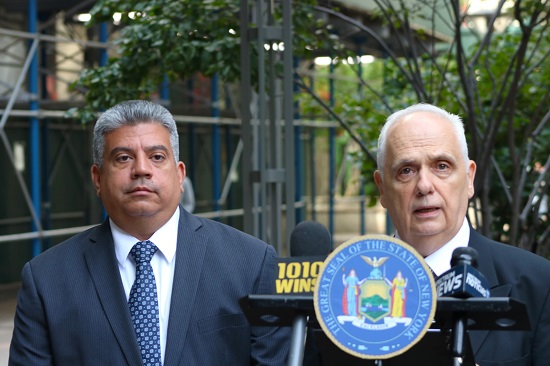 Assemblymember Joseph Lentol, right, announces the Hit-and-Run Prevention Act, supported by Acting Brooklyn District Attorney Eric Gonzalez, left. Eagle photo by Paul Frangipane.