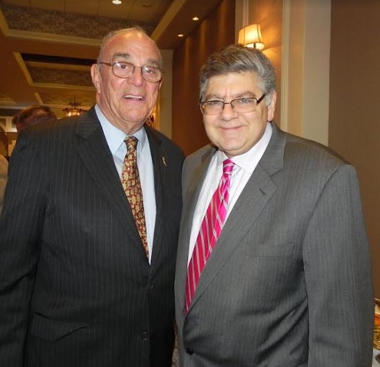 New York State Conservative Party Chairman Mike Long (left) says voters should make sure to turn over the ballot on Election Day to vote on the propositions listed on the ballot. At right is Brooklyn Conservative Party Chairman Jerry Kassar. Eagle file photo by Paula Katinas