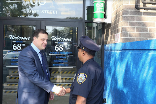 City Council candidate John Quaglione shakes hands with an officer from Brooklyn’s 68th Precinct. Photo courtesy of John Quaglione