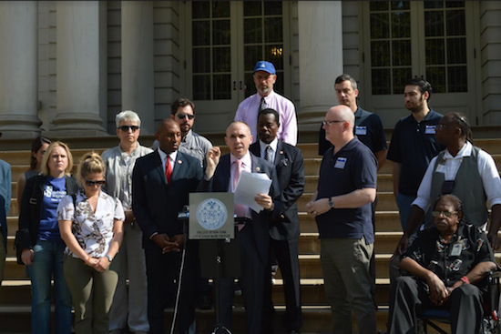 Councilmember Mark Treyger (at podium) says residents of his district know first-hand about the effects of a major storm. His district includes Coney Island, a community hit hard by Superstorm Sandy in 2012. Photo courtesy of Treyger’s office