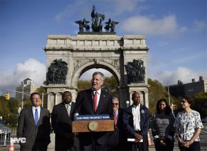 Mayor Bill de Blasio, backed by elected officials and commissioners, kicked off his weeklong “City Hall in Your Borough” visit to Brooklyn with the announcement that Prospect Park will soon be permanently car-free.  Photo courtesy of Ed Reed, Mayor’s Office