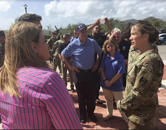 Reps. Dan Donovan and Debbie Wasserman Schultz (D-Florida) and other members of the delegation receive a briefing from Col. Rachel Smith (right) and personnel from the Combat Support Hospital in Humacao, Puerto Rico. Photo courtesy of Donovan’s office