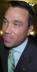 Michael Grimm greets a voter following a debate at Holy Angels Academy in Bay Ridge in 2014. Eagle file photo by Paula Katinas