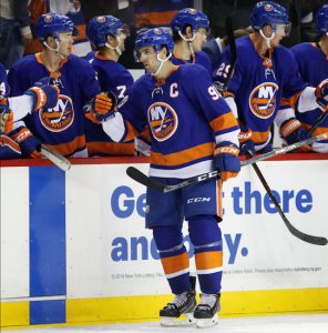 Islanders captain John Tavares accepts congratulations from the bench after scoring his team-high 11th goal of the season, and second of the game, Monday night against Vegas at Downtown’s Barclays Center. AP Photo by Kathy Willens