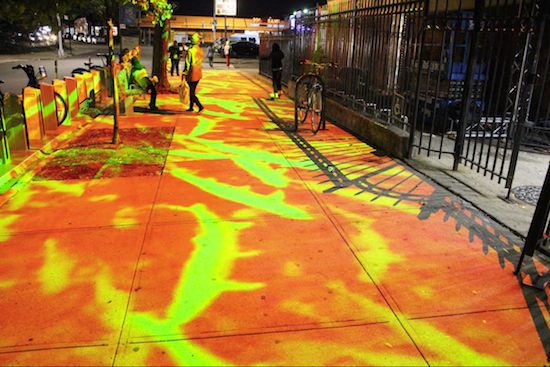 WATERSHED, a large-scale public art project by artist and third-generation Brooklynite Anita Glesta, transformed the sidewalk outside of the Red Hook library into a virtual ocean to raise awareness about rising sea levels and Red Hook’s vulnerability to natural disasters. Photo by Amy Aronoff for NYFA