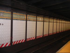 This photo, taken prior to the accident on Sunday, shows the wall tiles at the 86th Street R train station intact. Eagle photo by Paula Katinas