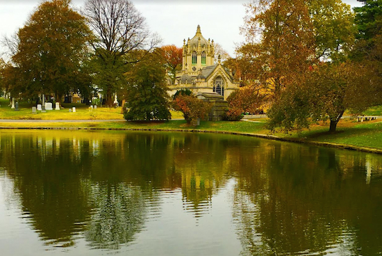 Green-Wood Cemetery's landmarked chapel is reflected in a glacial pond called Valley Water. Eagle photos by Lore Croghan