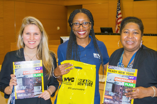 Katelyn James (left) and Sonja Orgias (center) from the Office of Emergency Management were invited to Kings County Supreme Court by Charmaine Johnson (right) to give court employees a crash course on emergency preparation on Nov. 20. Eagle photos by Rob Abruzzese.