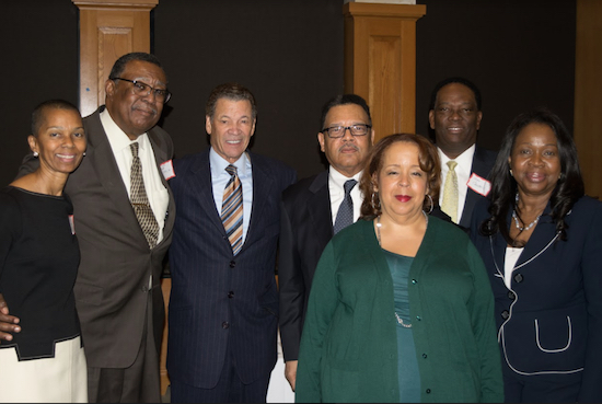 The Judicial Friends honored four retiring judges during its annual holiday reception. Pictured from left: President of Judicial Friends Hon. Ruth E. Shillingford, Hon. Eugene Oliver Jr., Hon. Richard B. Lowe, Hon. James Sullivan, Hon. Fern Fisher, Hugh Campbell and Hon. Sylvia Hinds-Radix. Eagle photos by Rob Abruzzese