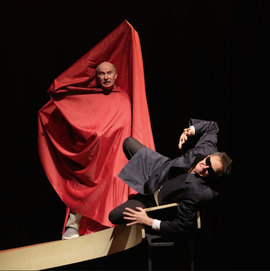 Marcello Magni (at left, wrapped in red drapery) and Jos Houben share a dramatic moment in the comic one-act “Marcel” at Polonsky Shakespeare Center. Photos by Gerry Goodstein