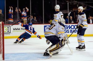 The Sabres can only watch in stunned amazement Wednesday night as Islanders super rookie Mathew Barzal skates away in triumph after delivering the game-winning goal in overtime at Downtown’s Barclays Center. AP Photo by Craig Ruttle