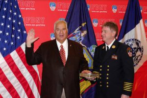 Hon. Bruce Balter is sworn in as a Deputy Chief by FDNY Chief of Dept. Leonard James. Eagle photos by Arthur De Gaeta