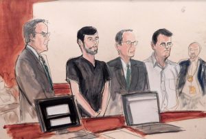 In this Dec. 17, 2015, file courtroom sketch, from left, defense attorney Baruch White, pharmaceutical entrepreneur Martin Shkreli, defense attorney Jonathan Sack and co-defendant Evan Greebel appear in court in New York. Greebel, a lawyer accused of helping Shkreli cover up a financial fraud, was convicted of conspiracy charges on Wednesday by a federal jury in Brooklyn. Elizabeth Williams via AP, File