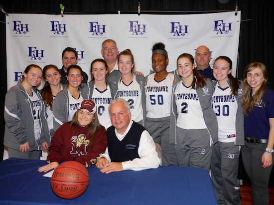 Katie Marquardt and Steven Oliver at the scholarship signing with the Bonnies and (back row, standing) team manager Will Fiore, assistant varsity coach and head junior varsity coach Bob Atanasio, assistant coach Mike Sammon and athletic trainer Alyssa Alaimo (far right). Eagle photos by Arthur De Gaeta