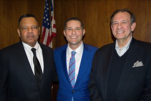 The Kings County Criminal Bar Association held its annual holiday party recently where it honored three retiring justices. Pictured from left: Hon. James P. Sullivan, KCCBA President Michael Cibella and Hon. Neil Firetog. Eagle photos by Rob Abruzzese