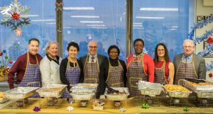 Civil and Housing Court judges donned aprons to serve food to their employees at this year’s holiday party. From left to right: Hon. Louis Nock, Hon. Robin Garson, Hon. Mary Rosado, Hon. Richard Montelione, Hon. Ingrid Joseph, Hon. Robin Sheares, Hon. Joy Campanelli and Hon. Michael Gerstein. Eagle photos by Paul Frangipane