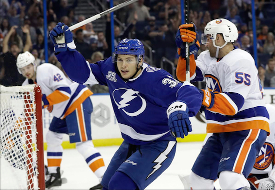 The Islanders could only watch as Tampa’s Yanni Gourde celebrated his go-ahead goal in the second period of New York’s 6-2 loss to the Lightning Tuesday night in a matchup of the NHL’s two highest-scoring teams. AP Photo by Chris O’Meara