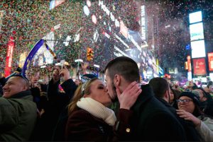 Kaitlyn Olivi of Yonkers, N.Y., and Lucas Pereira, of Sayreville, N.J., celebrate the New Year on Jan. 1, 2017 in Times Square. For those making New Year’s resolutions, Dr. Stephan Kamholz offered tips on how to keep them. AP Photo/Craig Ruttle