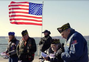 Veterans gather at American Veterans Memorial Pier to honor the soldiers who served at Pearl Harbor. Eagle photos by Arthur De Gaeta