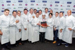 City Tech student Mimi Chen (center, holding book) was selected to represent the United States as the 2019 Team USA in the prestigious Bocuse d'Or competition in Lyon, France. She will be assisting Chef Matthew Kirkley (center left), formerly of San Francisco’s COI restaurant. Photo courtesy of City Tech
