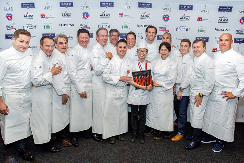 City Tech student Mimi Chen (center, holding book) was selected to represent the United States as the 2019 Team USA in the prestigious Bocuse d'Or competition in Lyon, France. She will be assisting Chef Matthew Kirkley (center left), formerly of San Francisco’s COI restaurant. Photo courtesy of City Tech