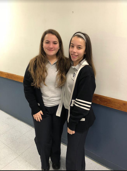Kristina Scarfo (left) and Teressa Martinelli are pleased that their scientific research papers have earned national recognition. Photo courtesy of Fontbonne Hall Academy