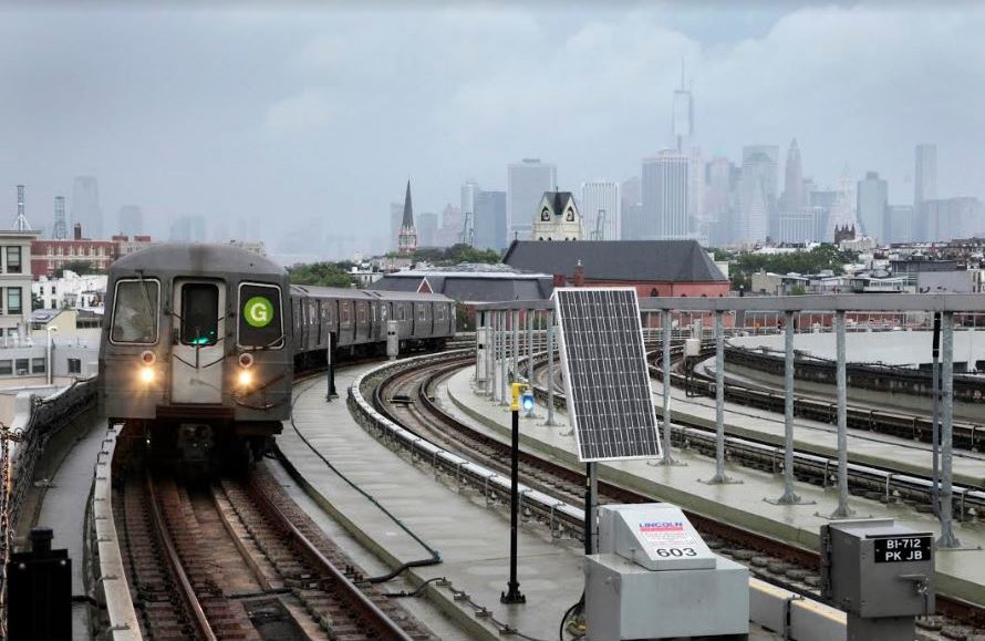 In this July 29, 2013, photo, the G train enters the elevated Smith-Ninth Streets station in Brooklyn. AP Photo/Mark Lennihan